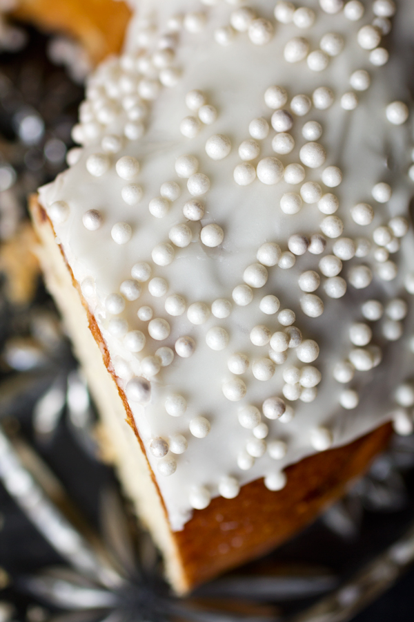 Overhead shot focused on the frosting of Cherry Almond Cake | thecozyapron.com