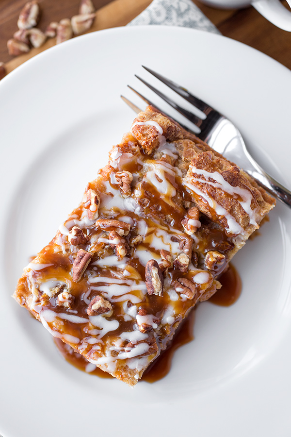 Cinnamon Roll Casserole with Caramel and Icing | thecozyapron.com