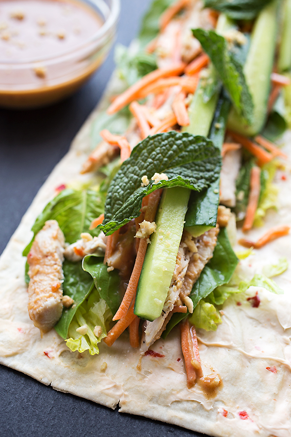 Peanut Chicken Spring Roll Wrap Being Assembled | thecozyapron.com