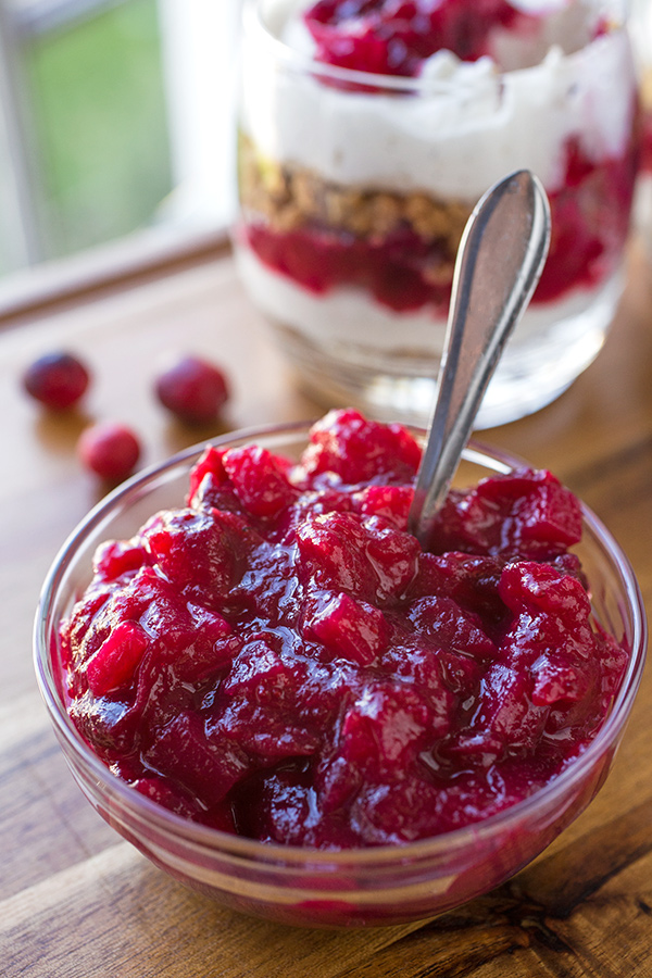 A ramekin of cranberry chutney for Cranberry Cheesecake Parfaits | thecozyapron.com