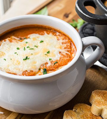 A bowlful of Grilled Cheese Tomato Soup | thecozyapron.com