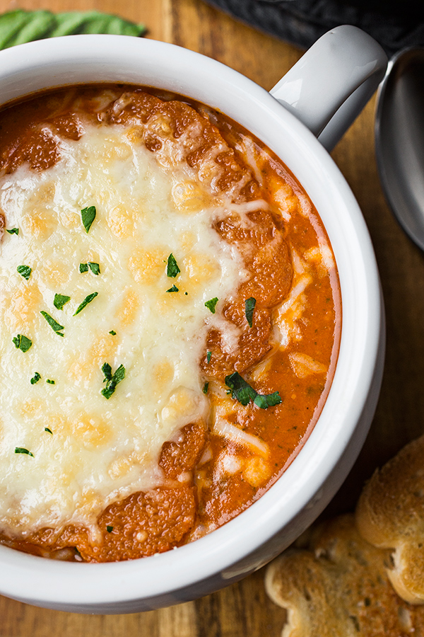 Closeup on a bowlful of Grilled Cheese Tomato Soup | thecozyapron.com