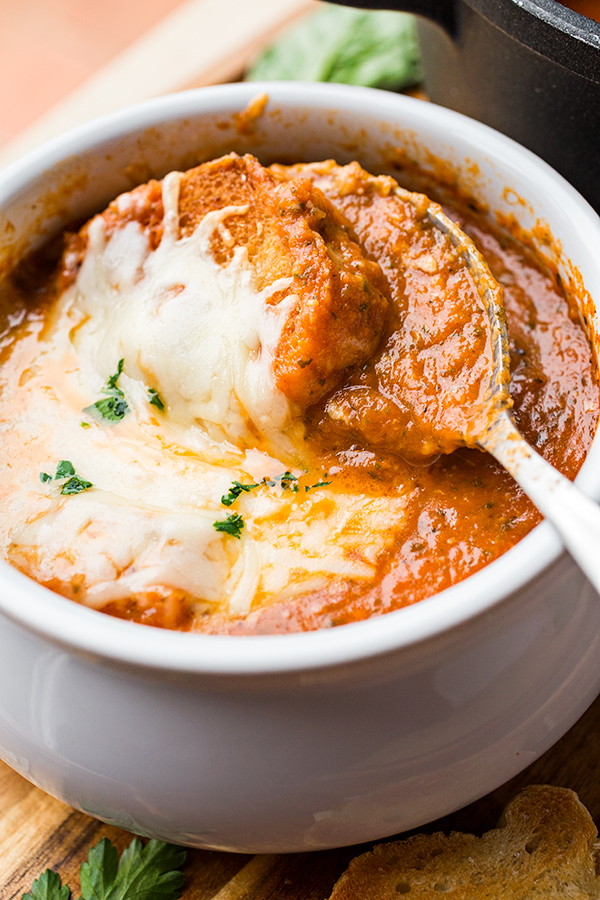 Closeup on a spoonful of Grilled Cheese Tomato Soup | thecozyapron.com