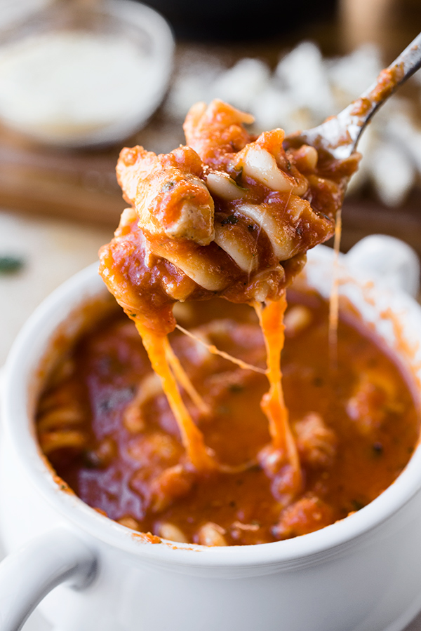 Cheesy Grilled Chicken Parmesan Soup With Fusilli Pasta And Fresh Basil