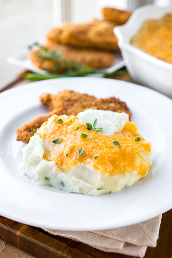 Cheesy Mashed Potatoes on Plate | thecozyapron.com