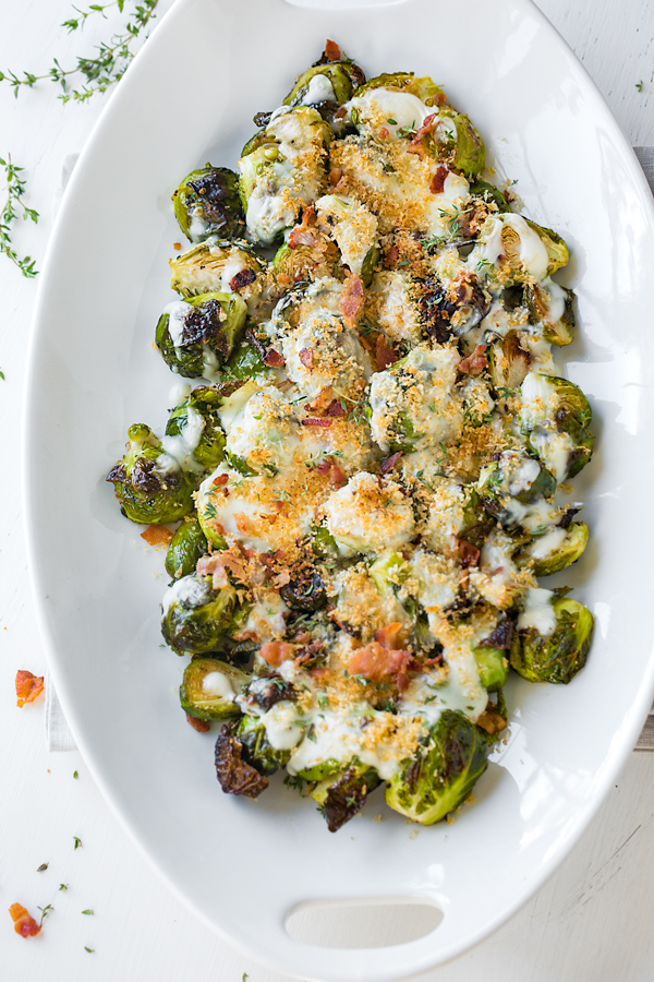 Platter of Roasted Brussels Sprouts with Creamy Parmesan Sauce | thecozyapron.com