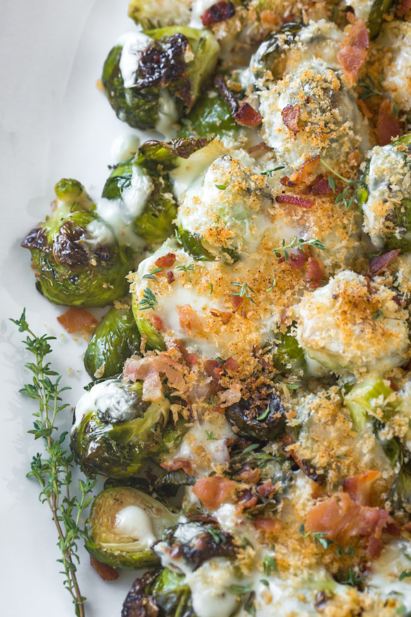 Roasted Brussels Sprouts with Creamy Parmesan Sauce and Bacon | thecozyapron.com