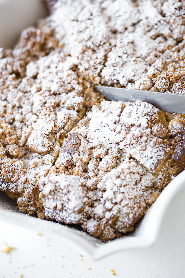 Slicing into Brioche French Toast Casserole | thecozyapron.com