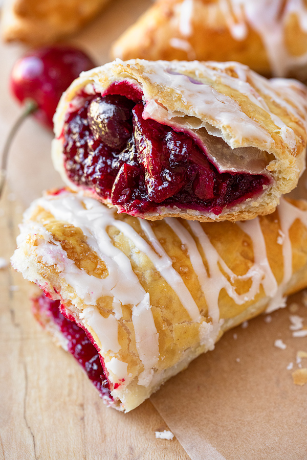 Glossy Cherry Filling Inside of a Cherry Turnovers | thecozyapron.com