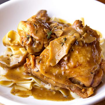Chicken with mushroom sauce over large noodles | thecozyapron.com