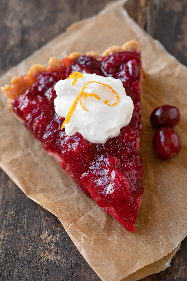 Slice of Cranberry Tart with Whipped Cream | thecozyapron.com