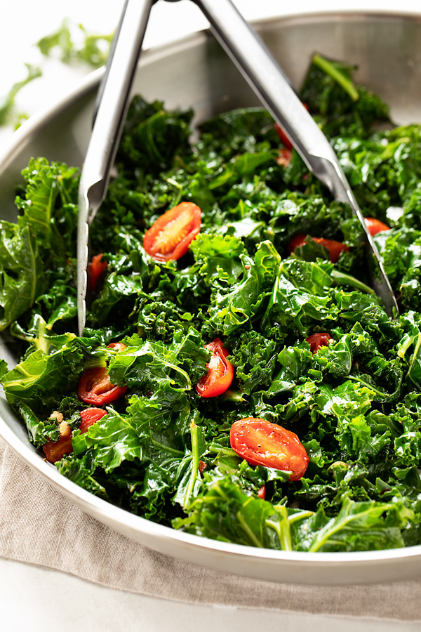 Sauteed Kale in a Skillet with Tongs | thecozyapron.com