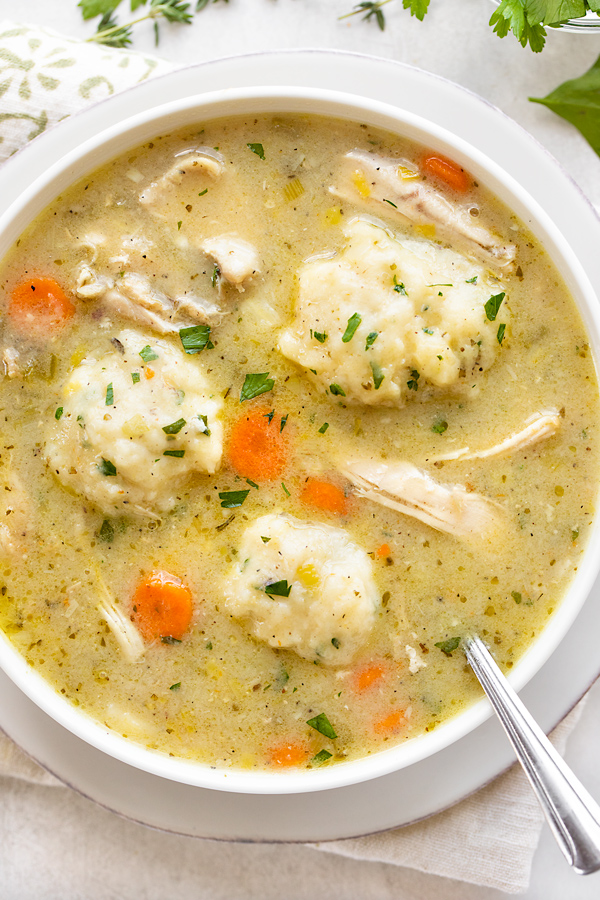 Bowl of Chicken and Dumpling Soup | thecozyapron.com