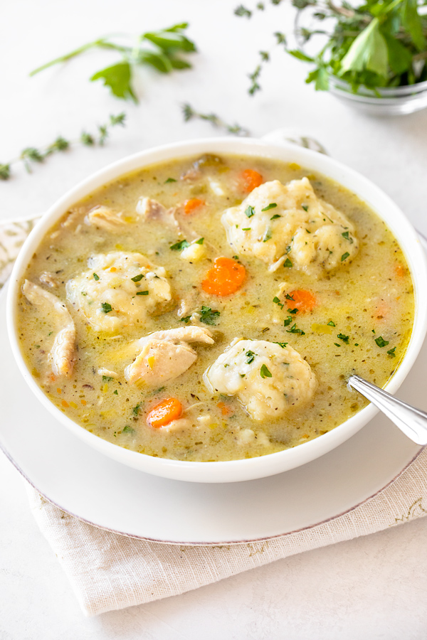 Bowl of Chicken and Dumpling Soup | thecozyapron.com