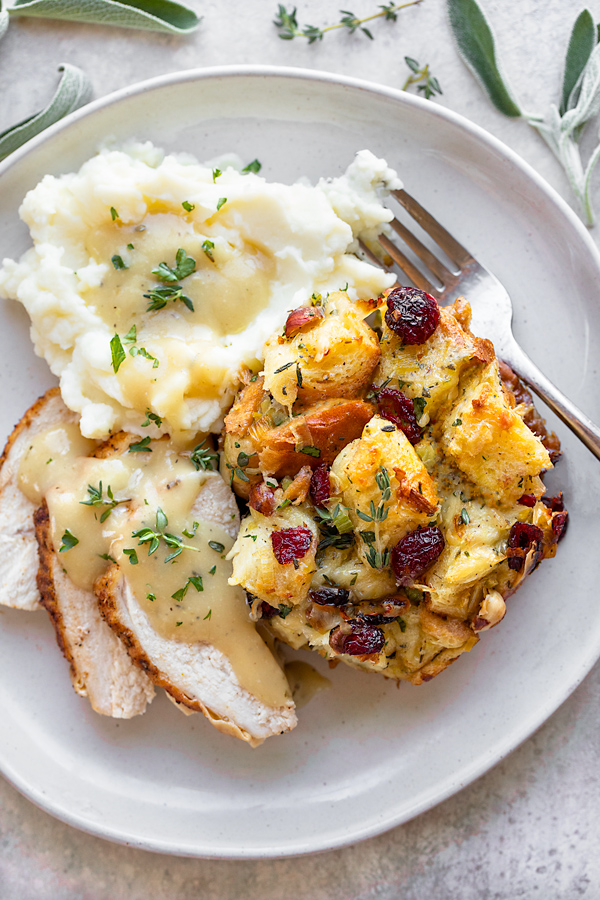 Cranberry Stuffing with Turkey, Mashed Potatoes and Gravy | thecozyapron.com