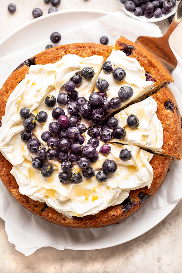 Lemon Blueberry Cake with Vanilla Mascarpone Whipped Cream | thecozyapron.com