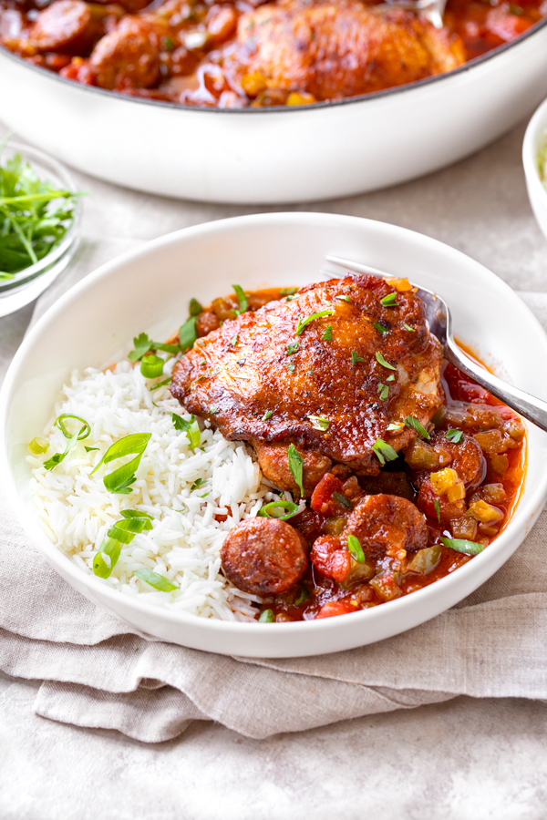 Braised Chicken with Andouille Sausage over Rice | thecozyapron.com