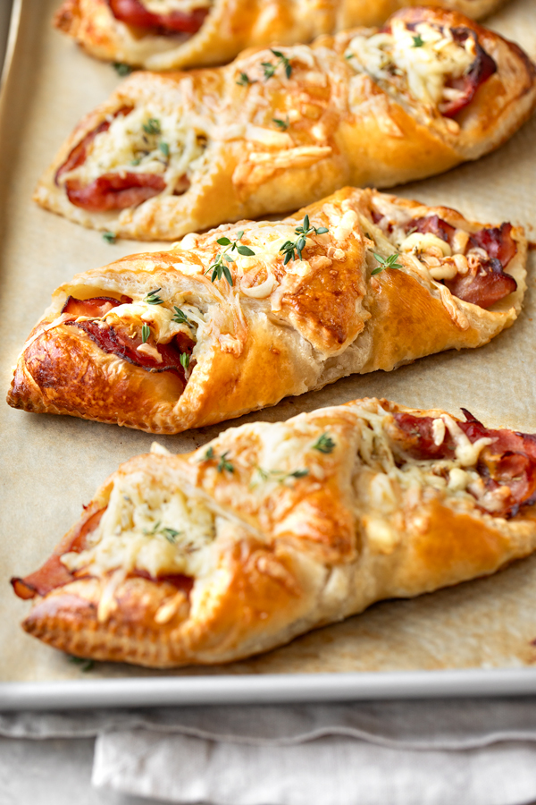 Warm Ham and Cheese Croissants on a Baking Sheet | thecozyapron.com