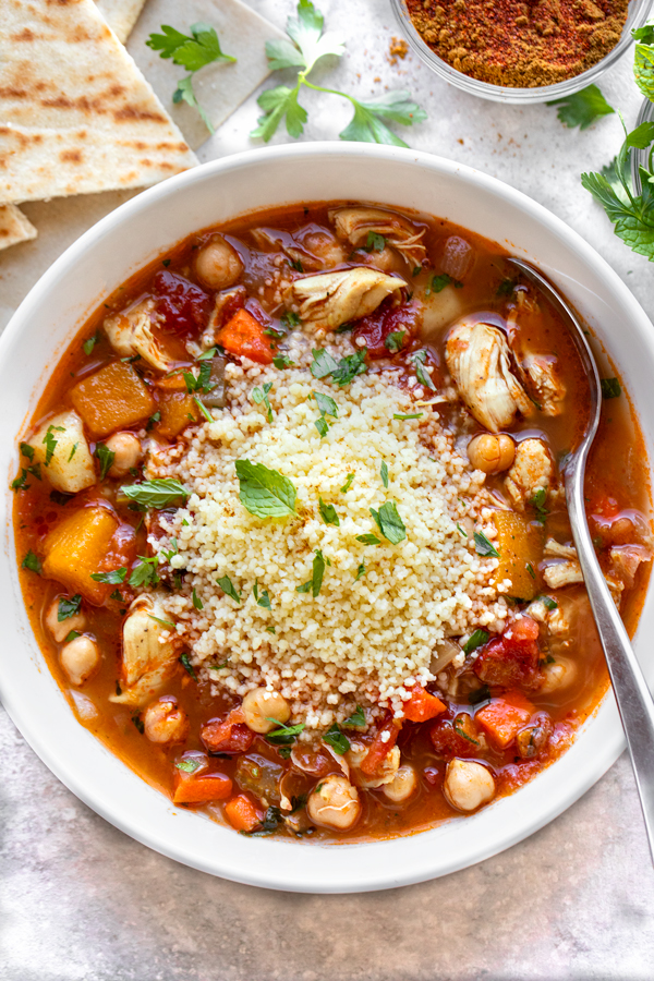 Closeup on a bowl of Moroccan Chicken Soup | thecozyapron.com
