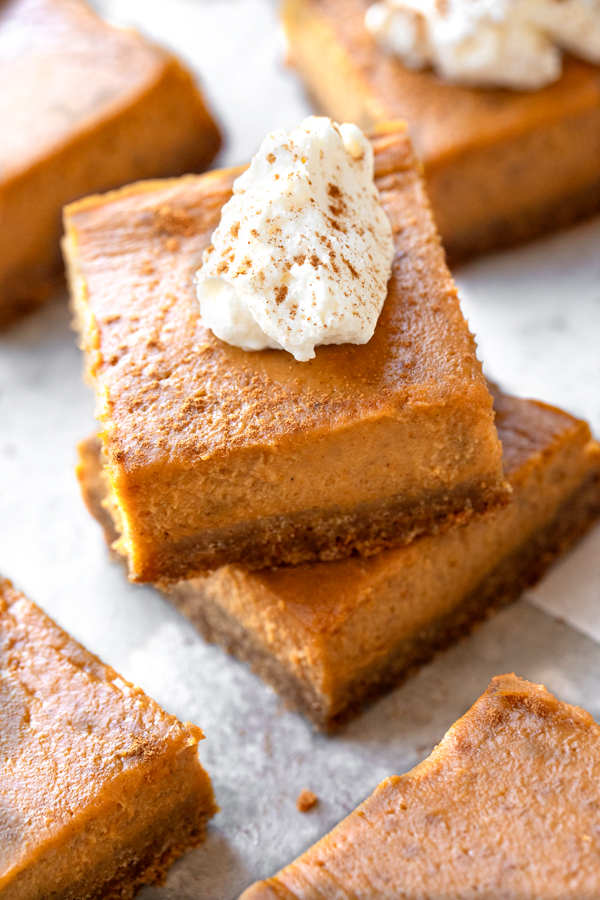 Closeup on a stack of Pumpkin Pie Bars | thecozyapron.com