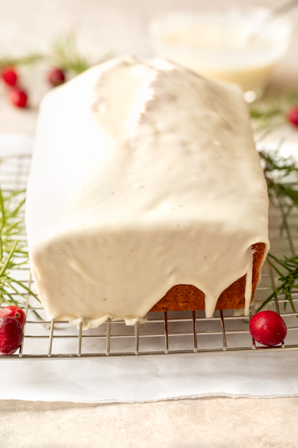 Cooled Eggnog Pound Cake drenched in Eggnog Icing | thecozyapron.com