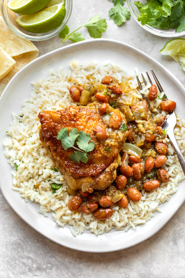 Salsa Verde Chicken with Beans over Rice | thecozyapron.com