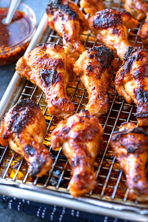 Spicy Chicken Wings with Chili Crisp fresh out of the oven | thecozyapron.com