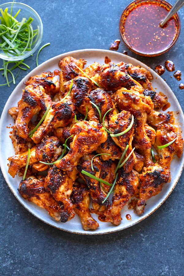 A plateful of Spicy Chicken Wings with Chili Crisp | thecozyapron.com