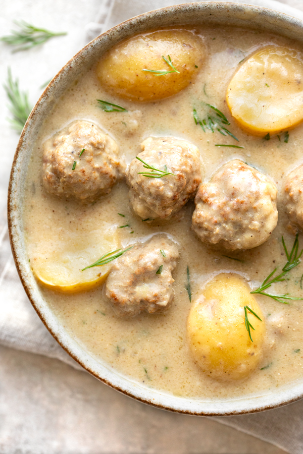 Closeup on a comforting bowl of Swedish Meatball Soup | thecozyapron.com