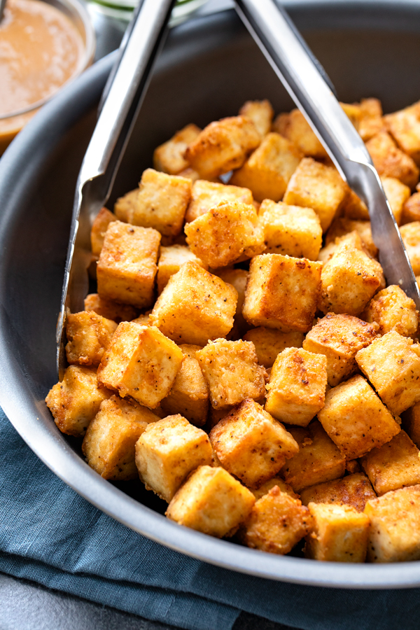 Crispy Tofu fresh out of the pan | thecozyapron.com