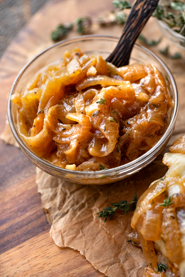 Close-up on a ramekin of French Onion Sauce for French Onion Burgers | thecozyapron.com