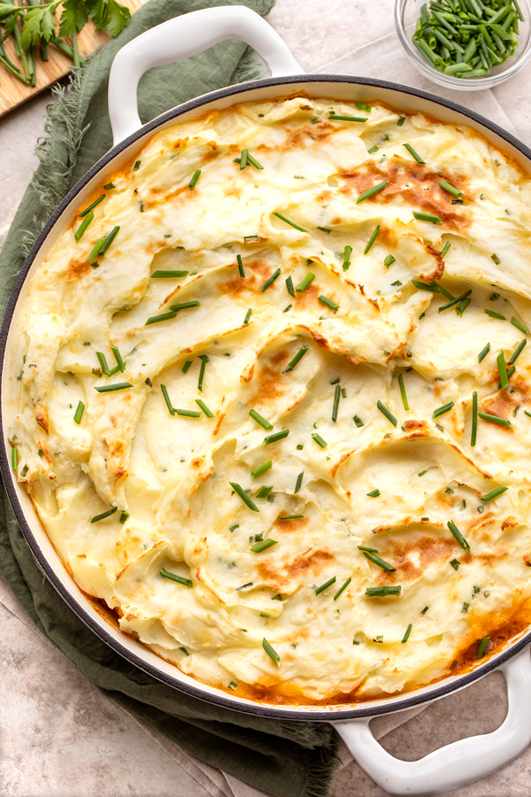 Cottage Pie with Cheddar-Chive Mashed Potatoes fresh out of the oven | thecozyapron.com