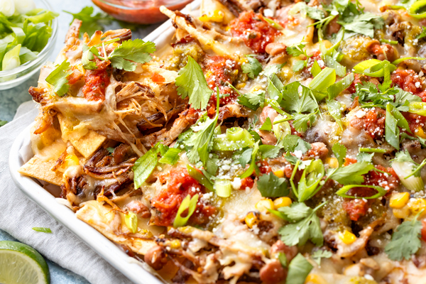 Pulled Pork Nachos on a Sheet Pan, fresh out of the oven | thecozyapron.com