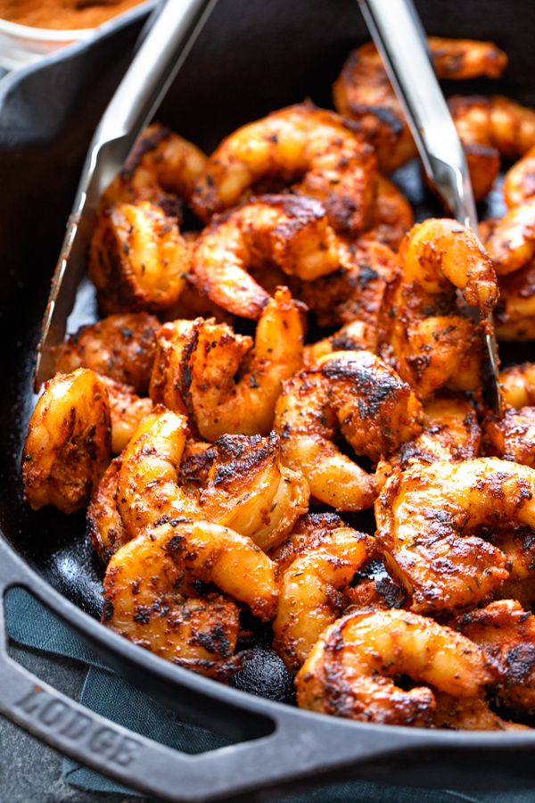Hot blackened shrimp in a cast Iron skillet | thecozyapron.com