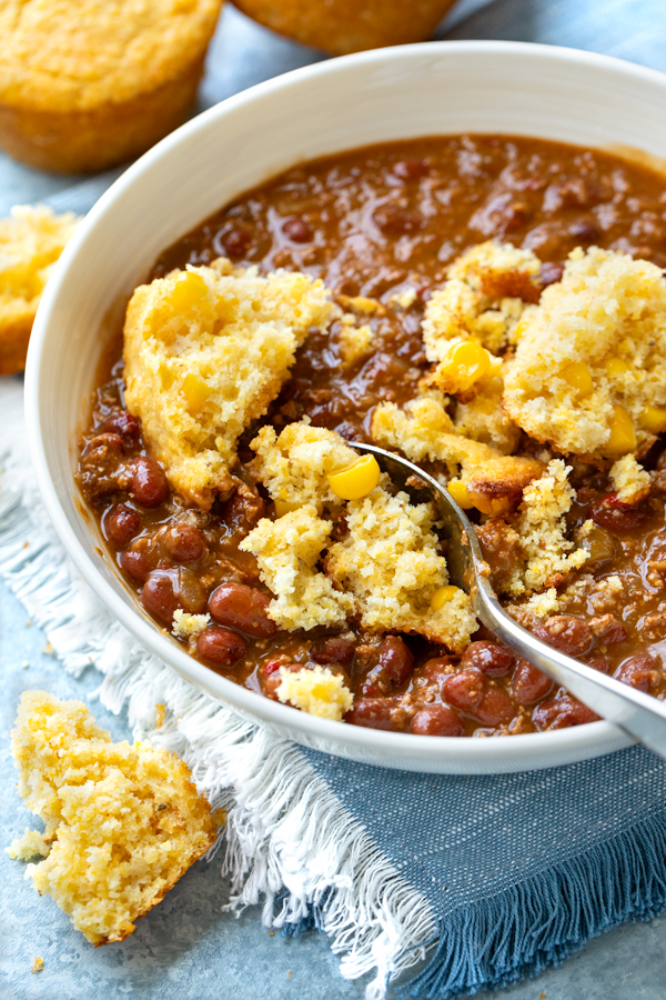 Crumbled Cornbread Muffin in a Bowl of Chili | thecozyapron.com