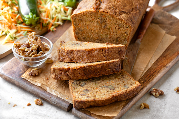 A freshly sliced loaf of Zucchini Carrot Bread | thecozyapron.com