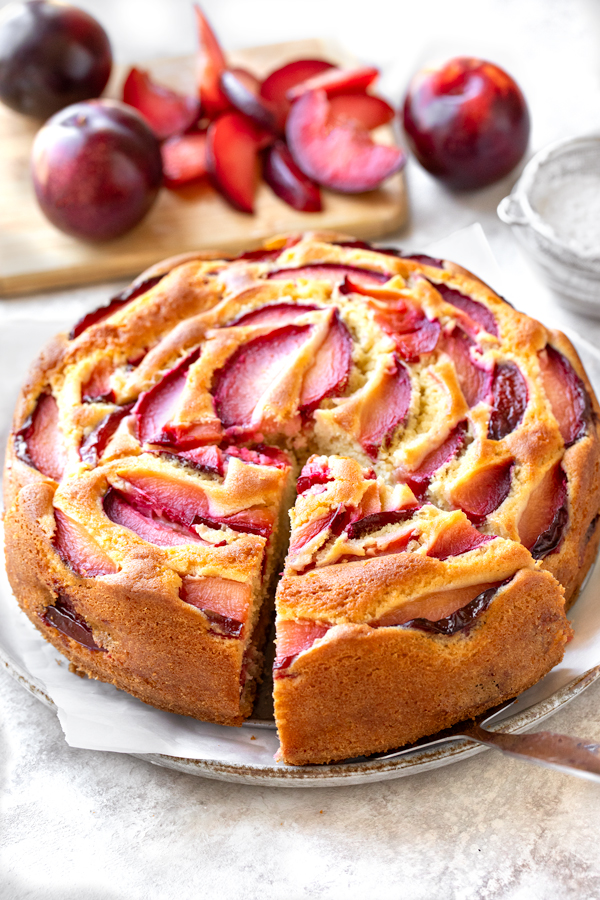 Homemade Plum Cake served on a cake plate | thecozyapron.com