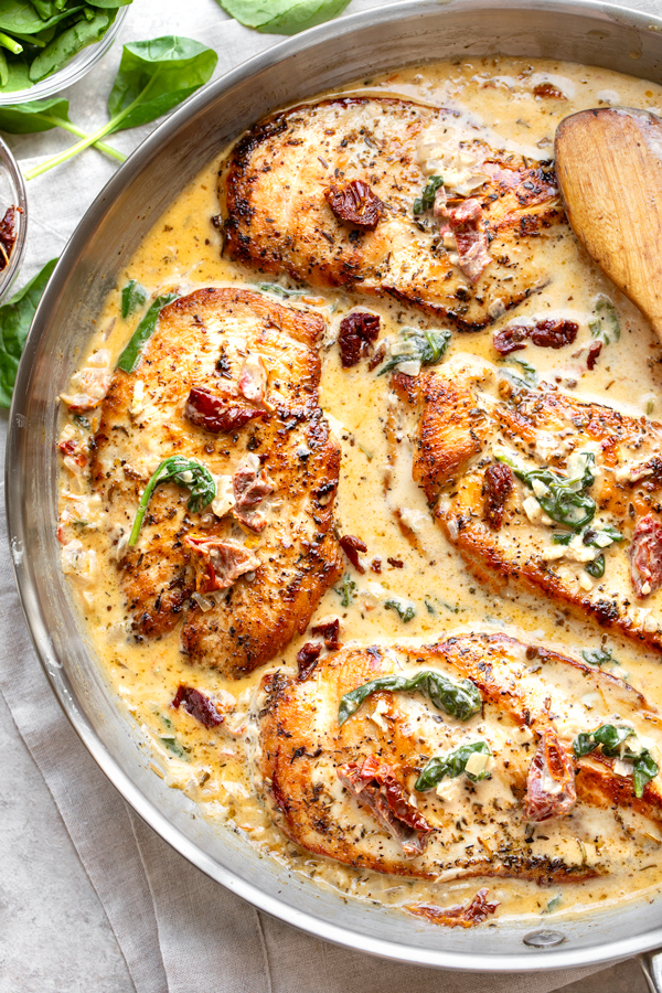 Freshly-made Tuscan Chicken in a Skillet | thecozyapron.com