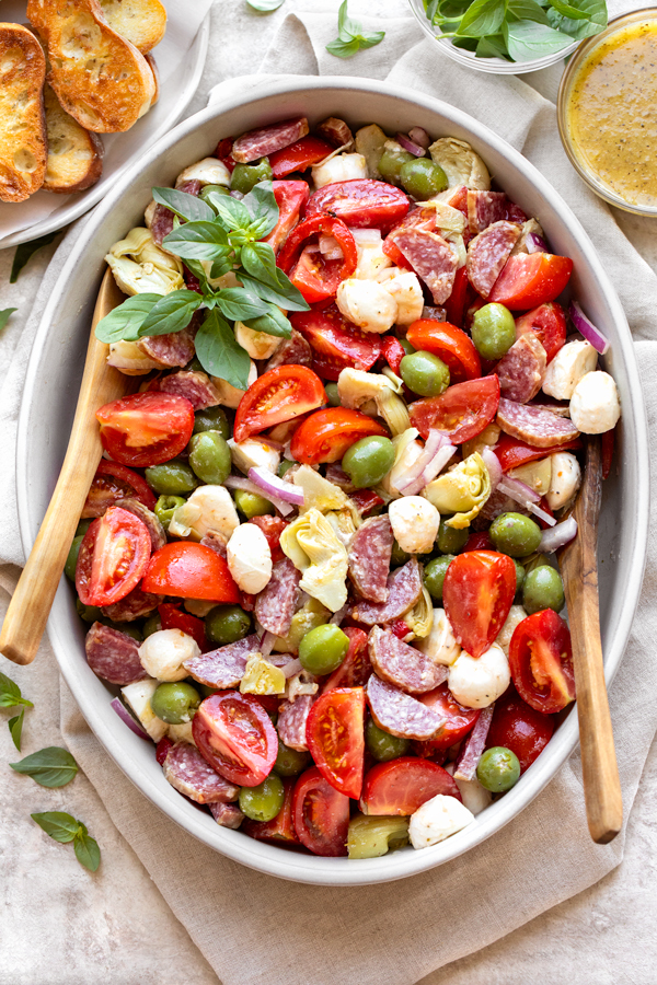 A beautiful overhead view of fresh Antipasto Salad in a serving bowl | thecozyapron.com
