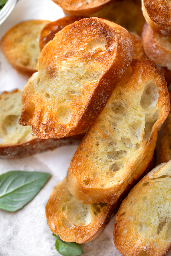 Close view of Garlic Crostini to Accompany Antipasto Salad | thecozyapron.com