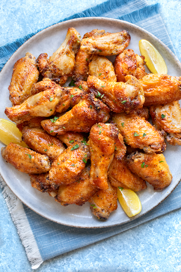 A fresh platter of homemade Lemon Pepper Wings | thecozyapron.com
