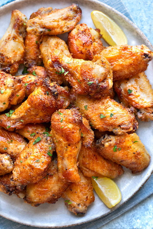 A fresh platter of homemade Lemon Pepper Wings | thecozyapron.com