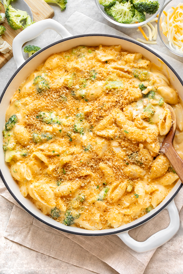 A pan of Shells and Cheese with Chicken and Broccoli, topped with crispy breadcrumbs | thecozyapron.com