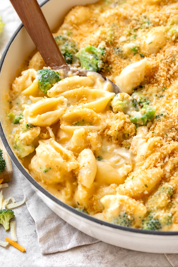 Closeup on a pan of Shells and Cheese with Chicken and Broccoli, topped with crispy breadcrumbs | thecozyapron.com