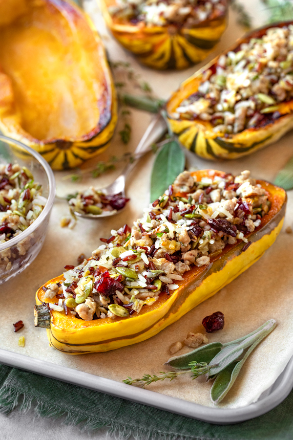 Stuffed Delicata Squash on a roasting pan | thecozyapron.com