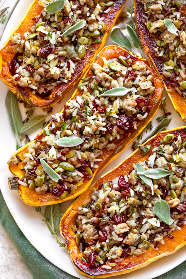Stuffed Delicata Squash on a serving platter | thecozyapron.com
