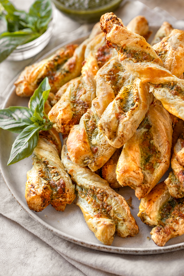 Stacked Cheese Twists on serving platter | thecozyapron.com
