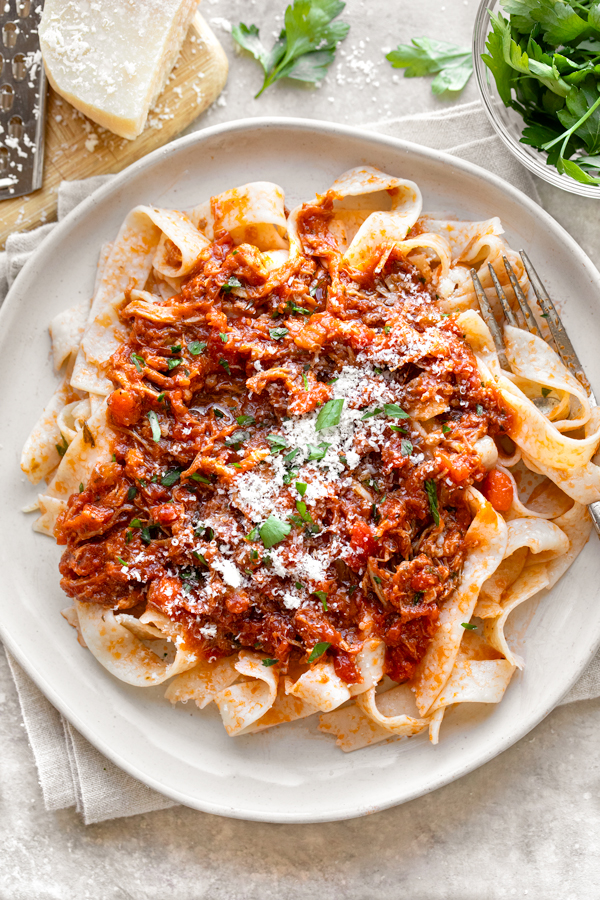 Overhead shot of a bowl of Pork Ragu over Tagliatelle Pasta | thecozyapron.com