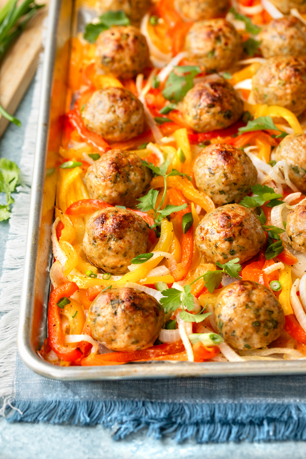 Freshly baked Chicken Meatballs with Peppers and Onions | thecozyapron.com