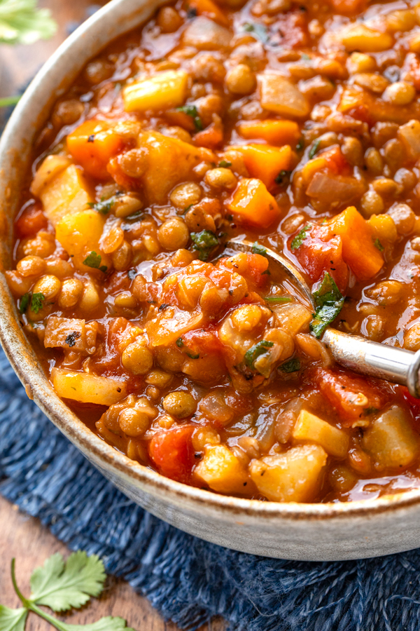 Closeup on a bowl of Lentil Vegetable Soup | thecozyapron.com
